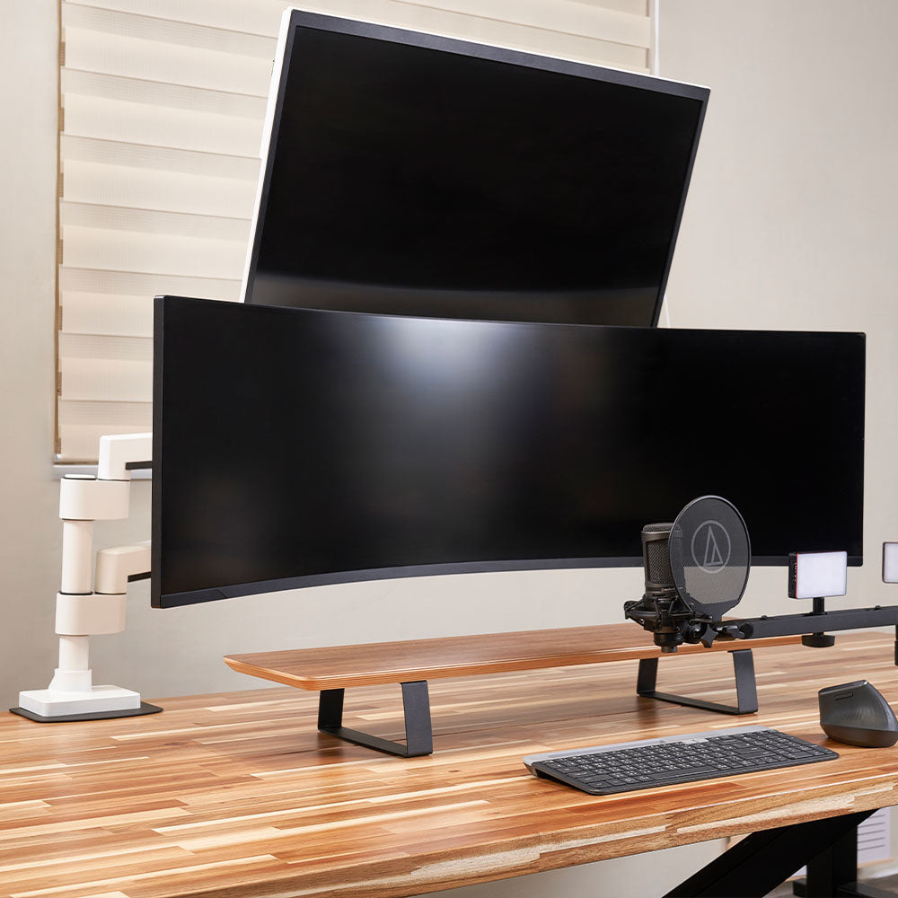 ULTRARM monitor arm and Moodular wooden monitor stand — modular, ergonomic, and designed for VISION ultrawide monitors. Enhances comfort, saves space, and elevates your workspace with precision craftsmanship.
